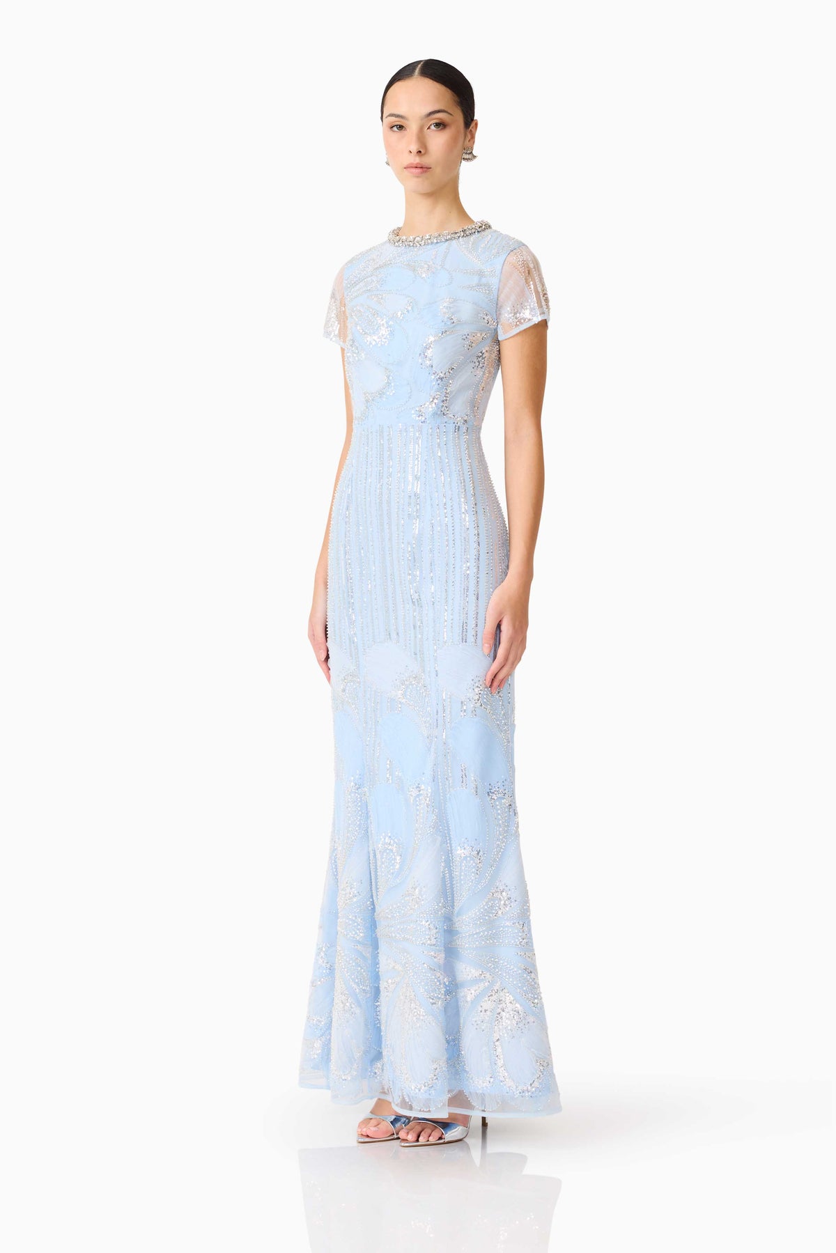Blue Elliatt Anabelle cap sleeve gown, elegant dress with a flowing silhouette and detailed neckline, perfect for formal occasions.