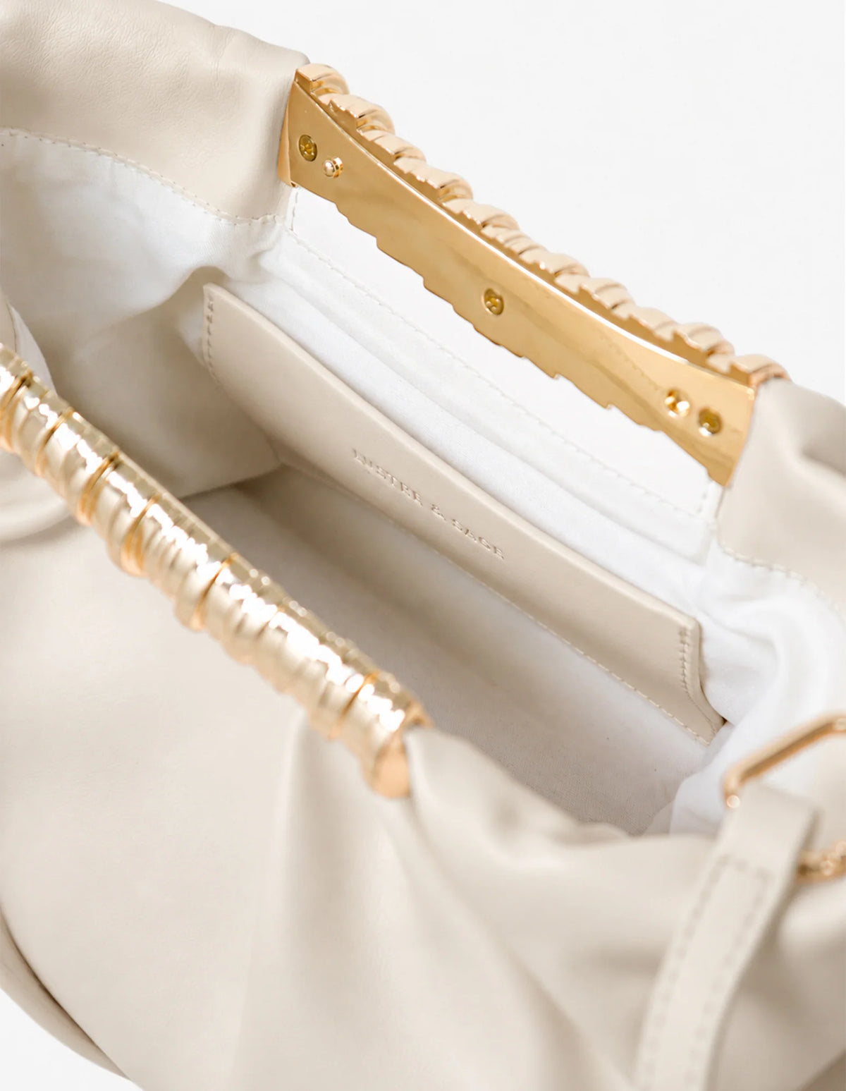 Aura Gathered Clutch Bag in Cream