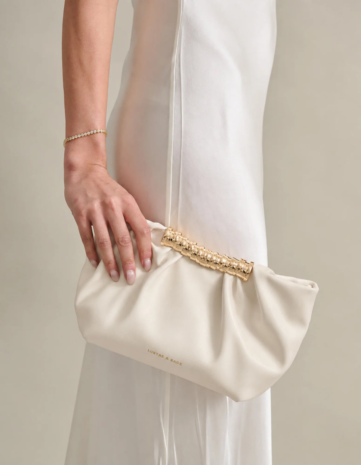 Aura Gathered Clutch Bag in Cream