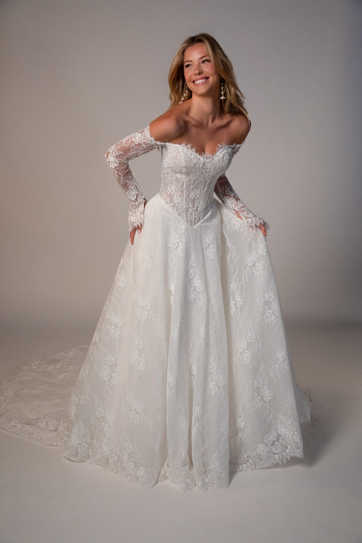 Elegant Stella York Meadowbank wedding gown with lace details, arriving November, shown in a 1280x1920 image.