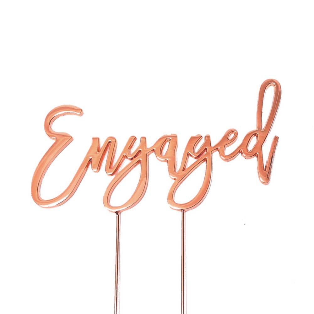 Gold "Engaged" cake topper by Cake and Candle, decorative giftware for engagement celebrations.