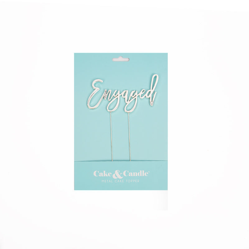 Gold "Engaged" cake topper by Cake and Candle for wedding or engagement celebrations, decorative giftware accessory.