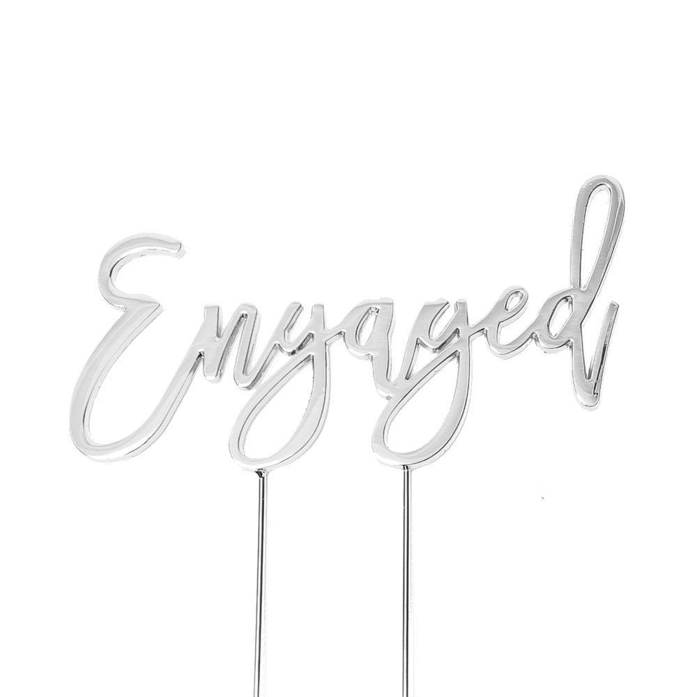 Gold "Engaged" cake topper from Cake and Candle giftware, decorative wedding cake accessory with elegant design.