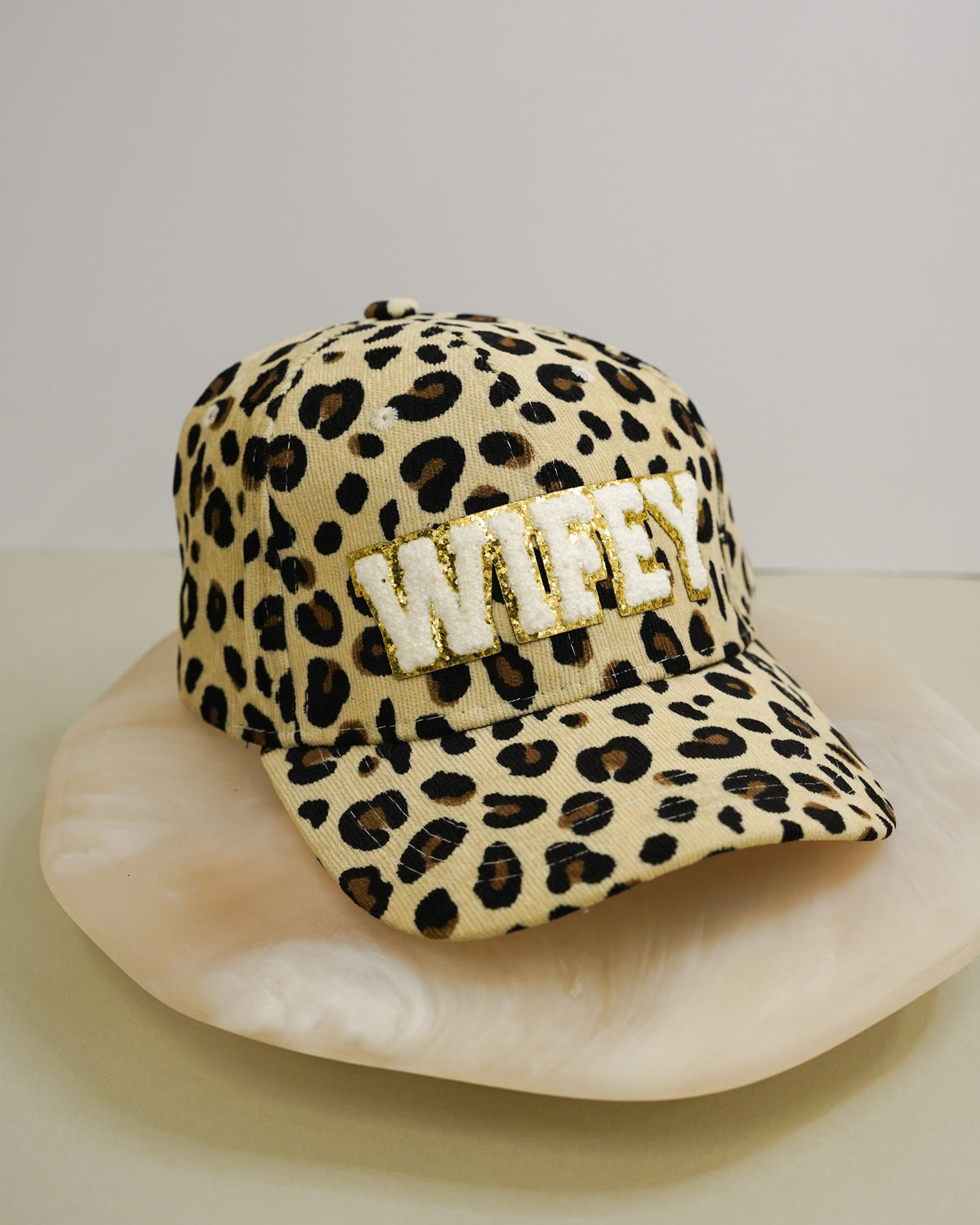 WIFEY corduroy cap with leopard print from Honey Fawn Boutique, stylish giftware accessory in crème color.
