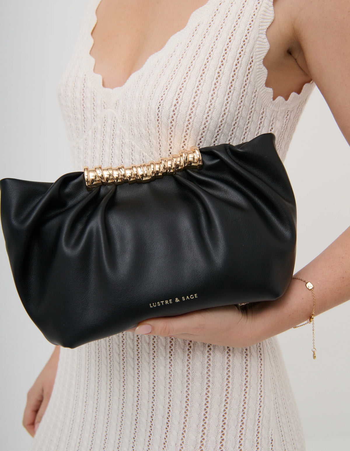 Aura Gathered Clutch Bag in Black